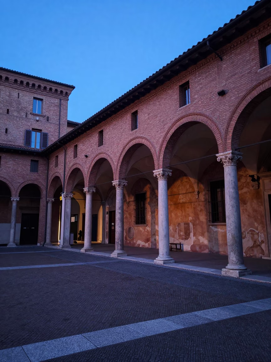 Early Morning Dawn Light on Bologna Porticoes with Local Street Details in in Bologna, Italy