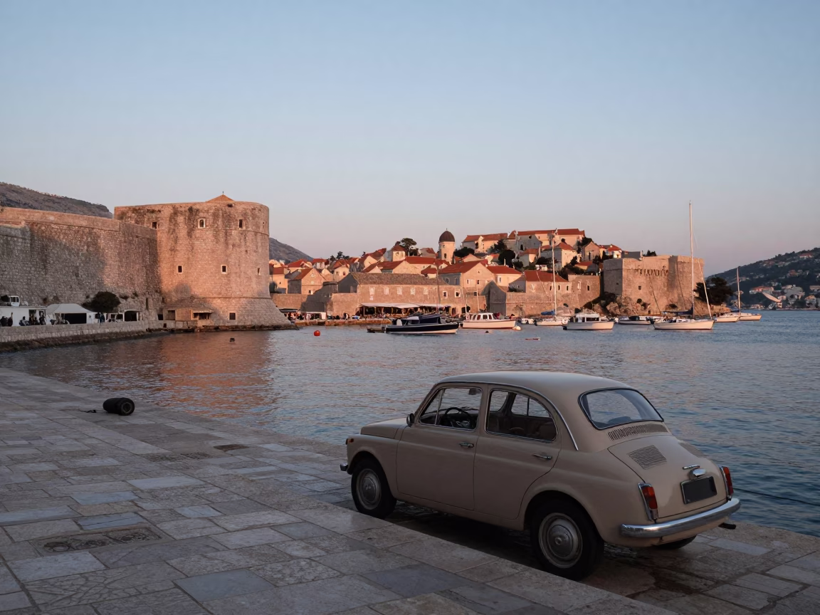 Early Morning Dubrovnik Harbor Scene with Vintage Car and Local Fisherman Before Sunrise in in Dubrovnik, Croatia