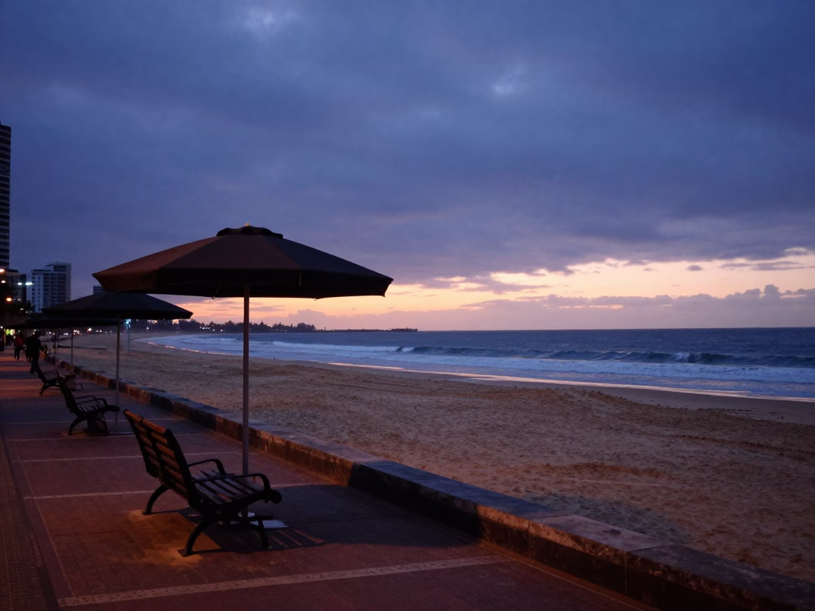 Early Morning Durban Beachfront Promenade Before Sunrise With Umbrella Stand And Notebook in in Durban, South Africa