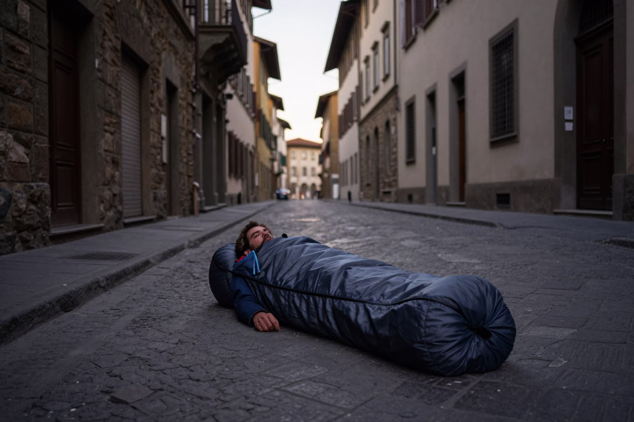 Early Morning Florence Street Scene with Sleeping Bag and Linen Curtains in in Florence, Italy