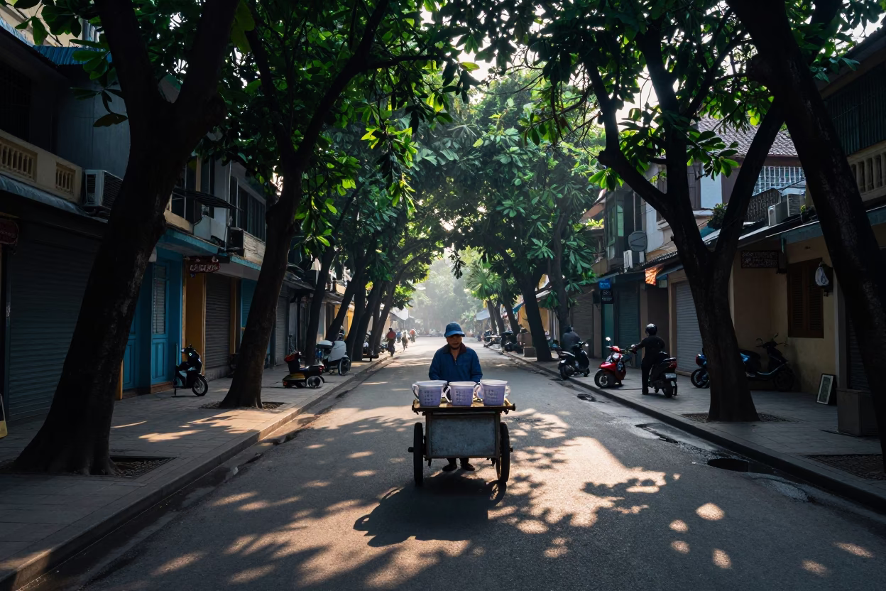 Early Morning Hanoi Street Scene with Measuring Cups and Local Breakfast Preparation in in Hanoi, Vietnam