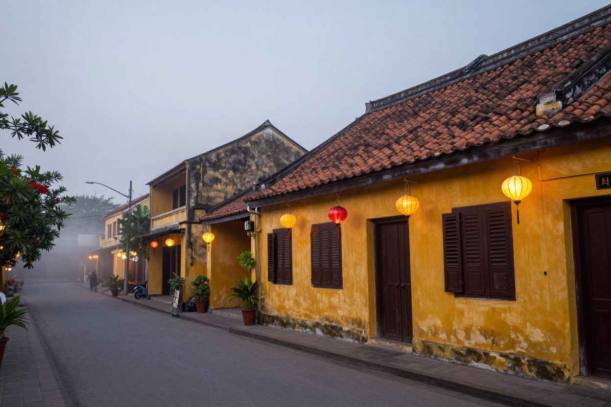 Early Morning Hoi An Street Scene with Lanterns and Misty River Reflections in in Hoi An, Vietnam