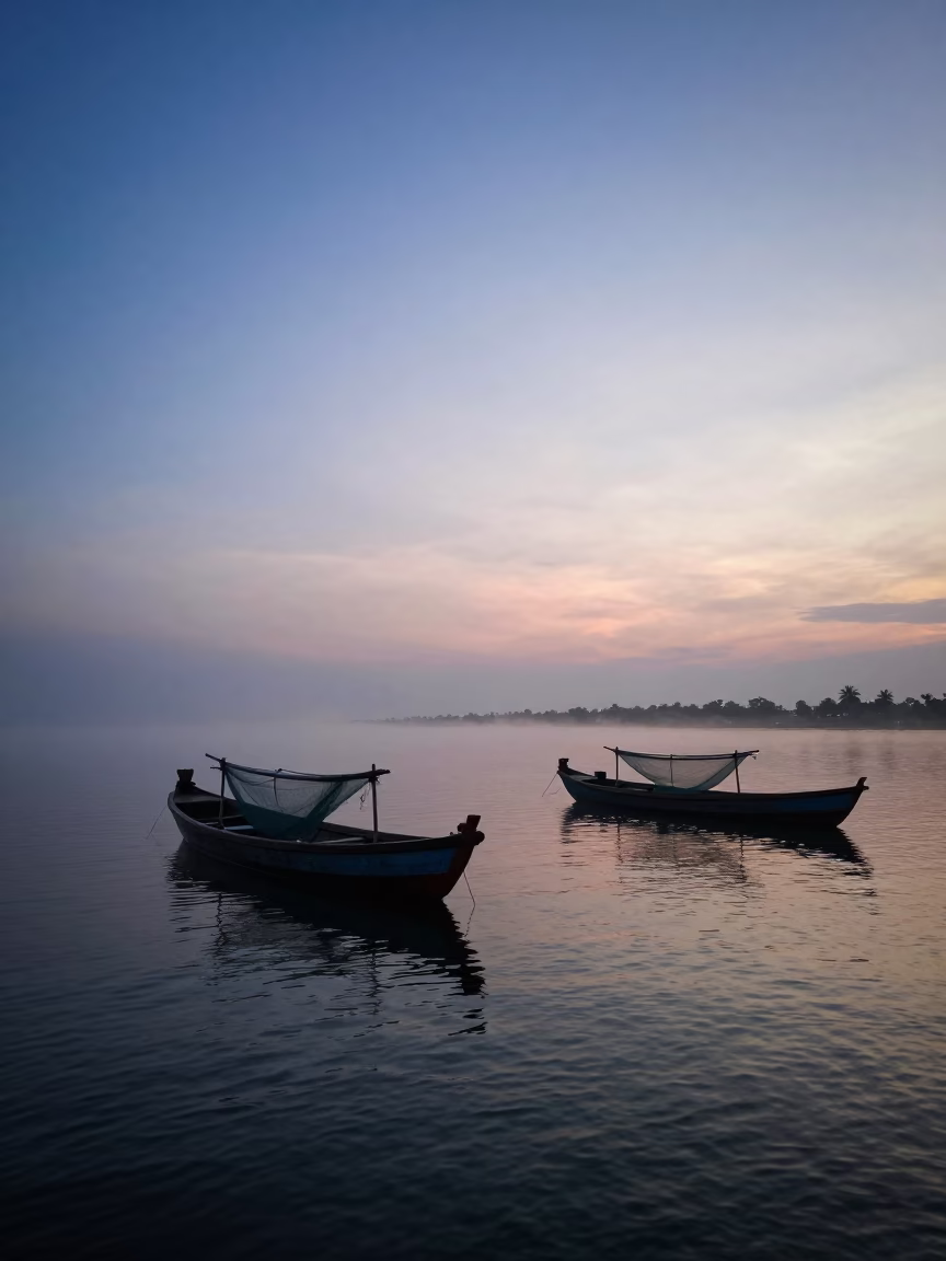 Early Morning Kochi Backwaters with Fishing Boats and Misty Sunrise Light in in Kochi, India
