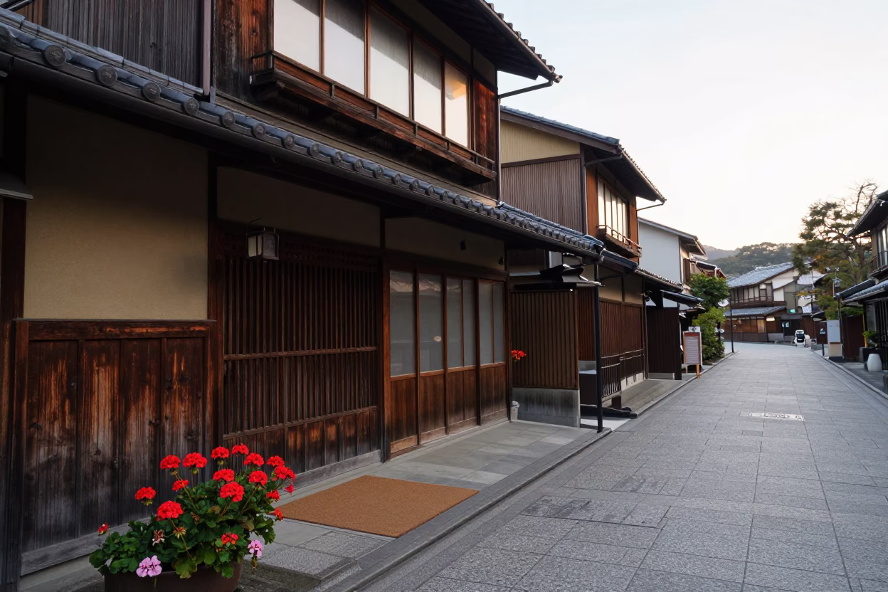 Early Morning Kyoto Street Scene with Geraniums and Doormat Outside Traditional Shop in in Kyoto, Japan
