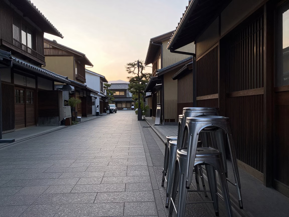 Early Morning Kyoto Street Scene with Metal Stools and Morning Light in in Kyoto, Japan