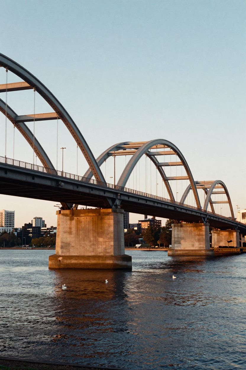 Early Morning Light Illuminates Perth City Bridge and Swan River Water Taxi in in Perth, Western Australia, Australia
