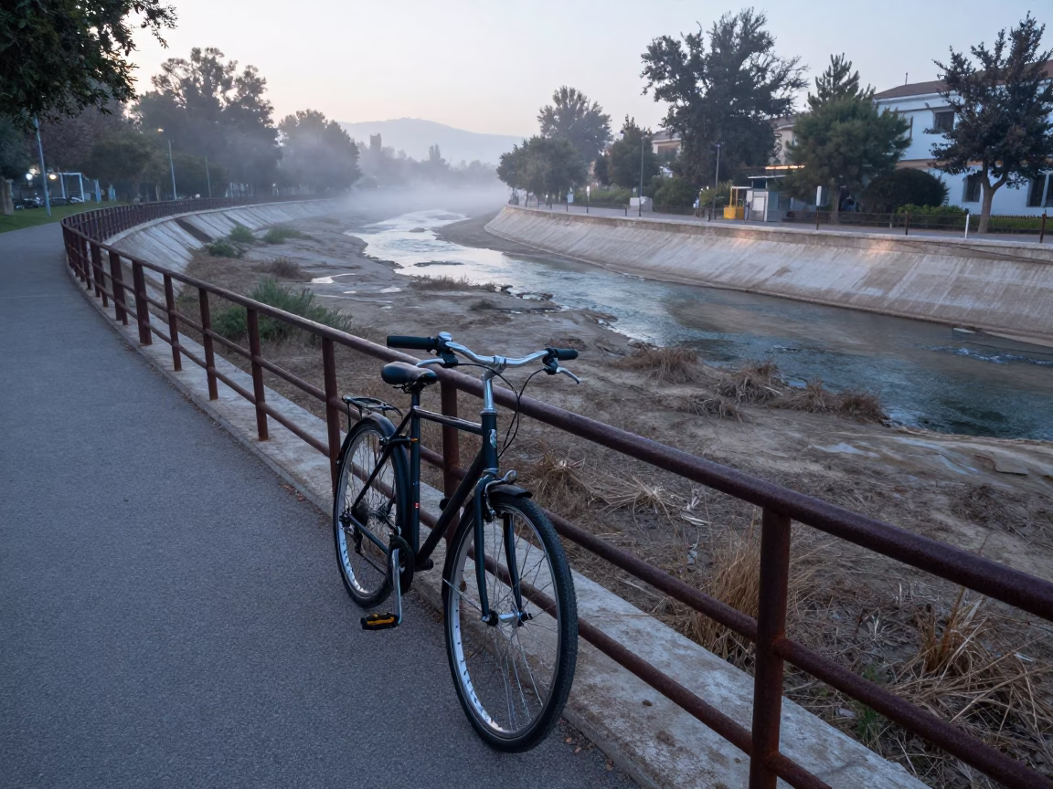 Early Morning Light on Valencia Turia Riverbank Amidst Quiet Park Trails in in Valencia, Spain