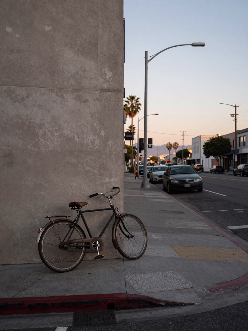Early Morning Los Angeles Street Scene with Vintage Bicycle and Concrete Sidewalk in in Los Angeles, California, United States