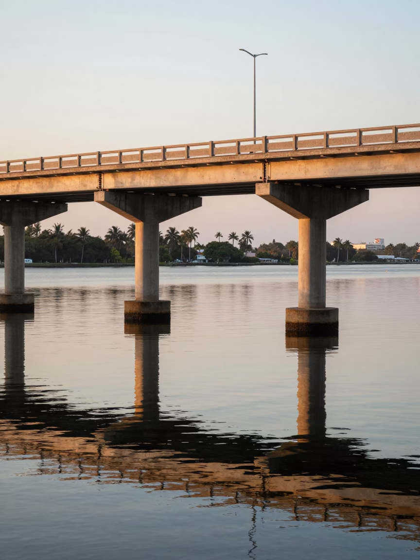 Early Morning Miami Florida Bridge Pier Reflections and Tropical Heliconia Blooms in in Miami, Florida, United States