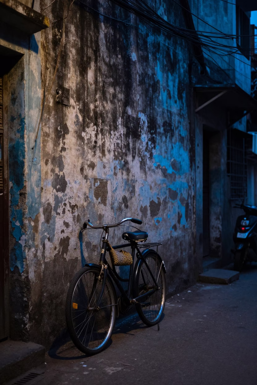 Early Morning Mumbai Street Scene with Bicycle and Woven Baskets in Pre-Dawn Light in in Mumbai, India