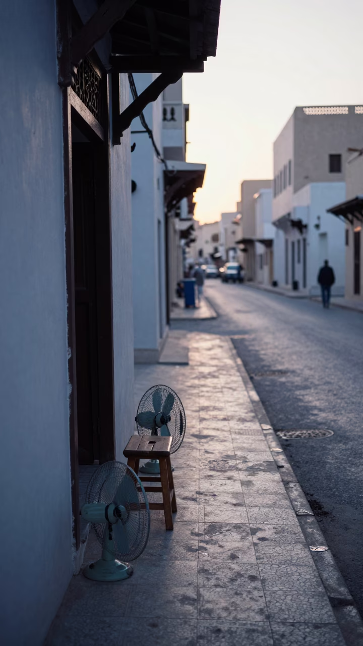 Early Morning Muscat Street Scene with Stool and Fans Before Sunrise in in Muscat, Oman