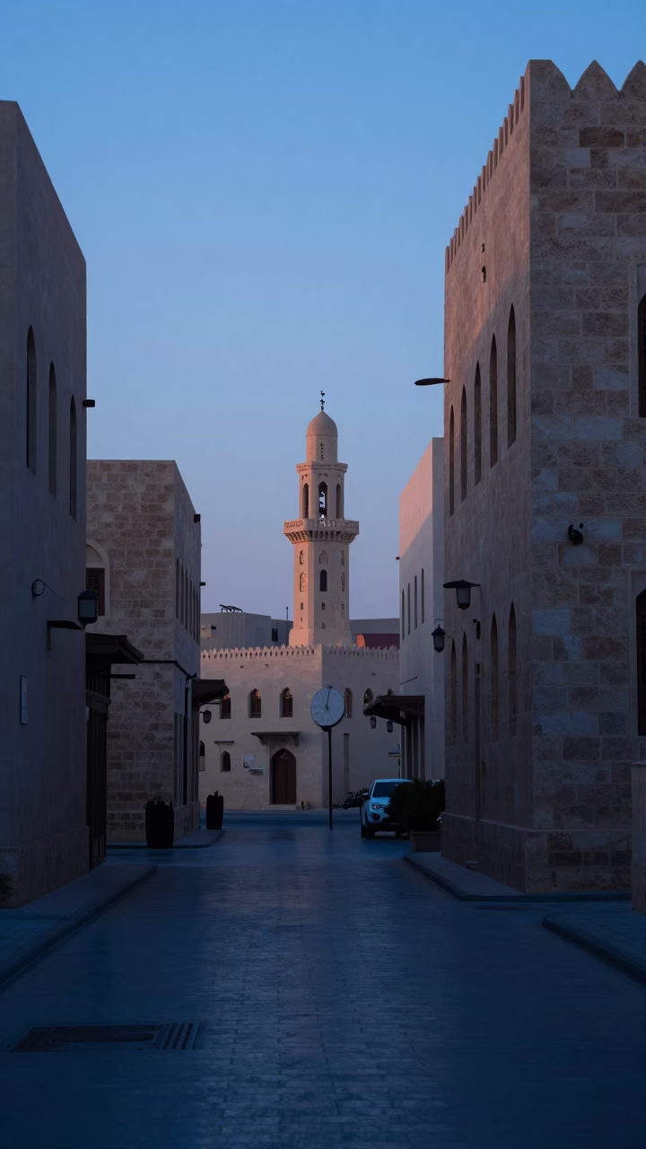 Early Morning Muscat Street Scene with Sundial and Traditional Market Activity Before Sunrise in in Muscat, Oman