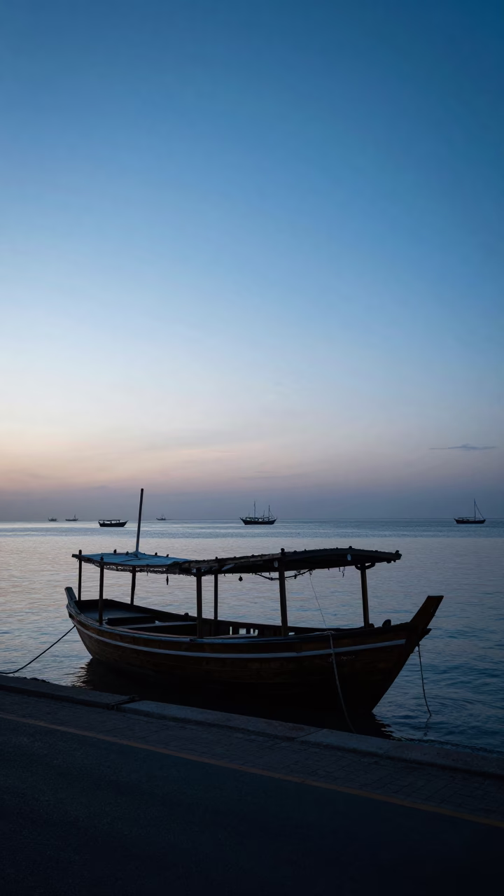 Early Morning Muscat Street Scene with Traditional Dhows and Coastal Light in in Muscat, Oman