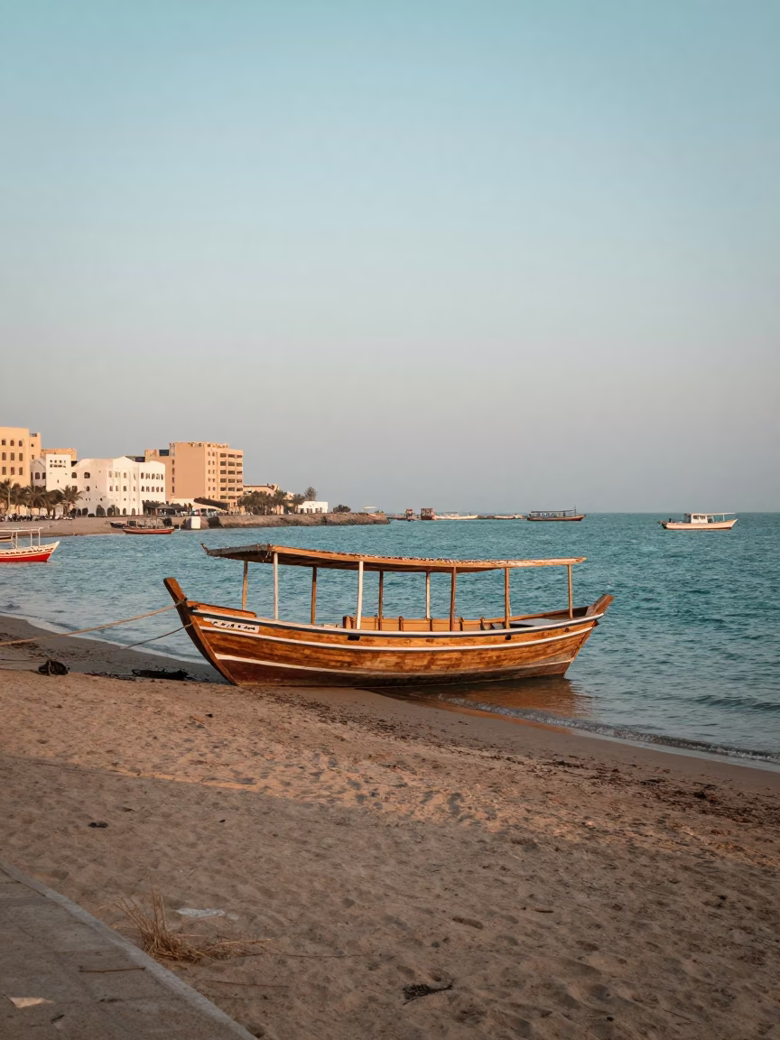 Early Morning Muscat Street Scene with Traditional Dhows and Local Commerce in in Muscat, Oman