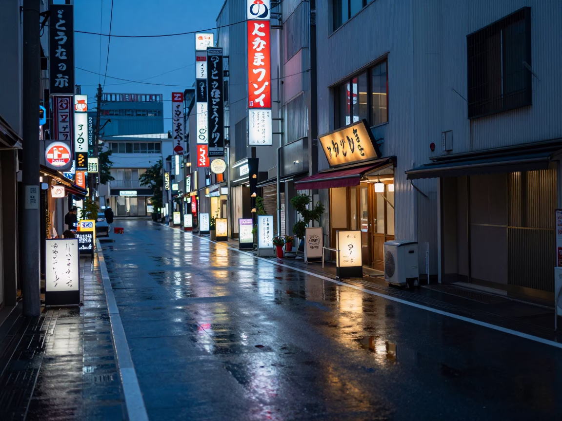 Early Morning Osaka Street Scene with Neon Reflections and Distant Skyline in in Osaka, Japan