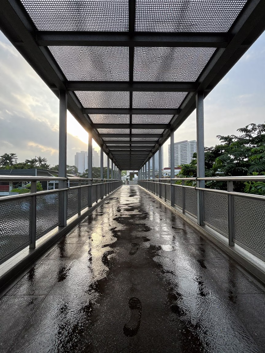 Early Morning Pedestrian Overpass in Kuala Lumpur Malaysia with Wet Footsteps in in Kuala Lumpur, Malaysia