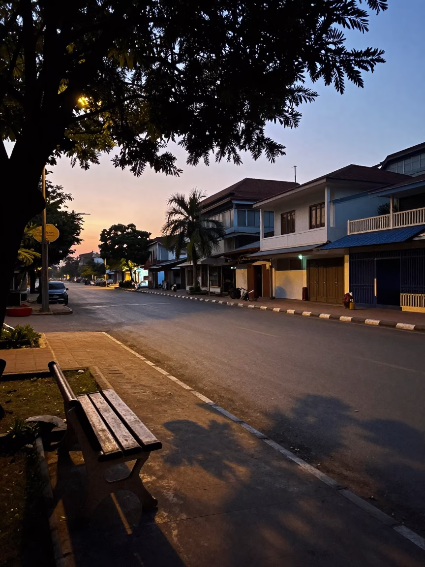Early Morning Phnom Penh Street Scene with Leaf Shadows on Bench and Wicker Details in in Phnom Penh, Cambodia
