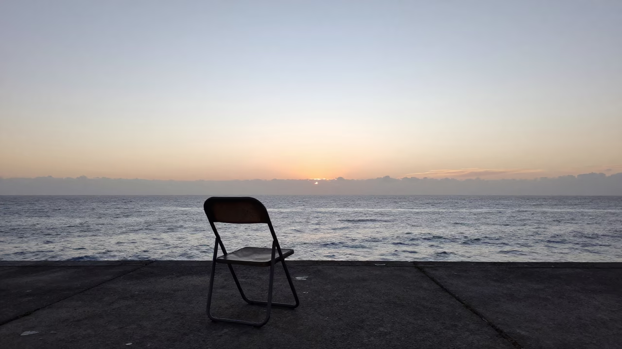 Early Morning Salvador Brazil Horizon Shot with Folding Chair and Paint Flecks in in Salvador, Brazil