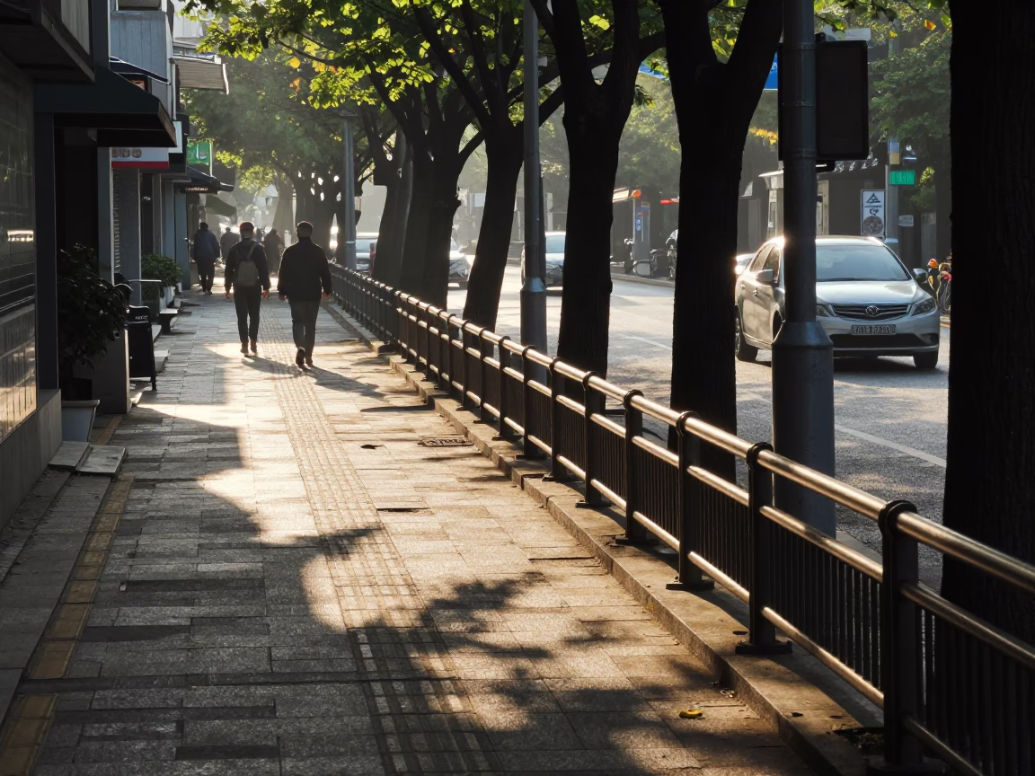 Early Morning Seoul Street Scene with Leaf Shadows on Rail and Sunlight in in Seoul, South Korea