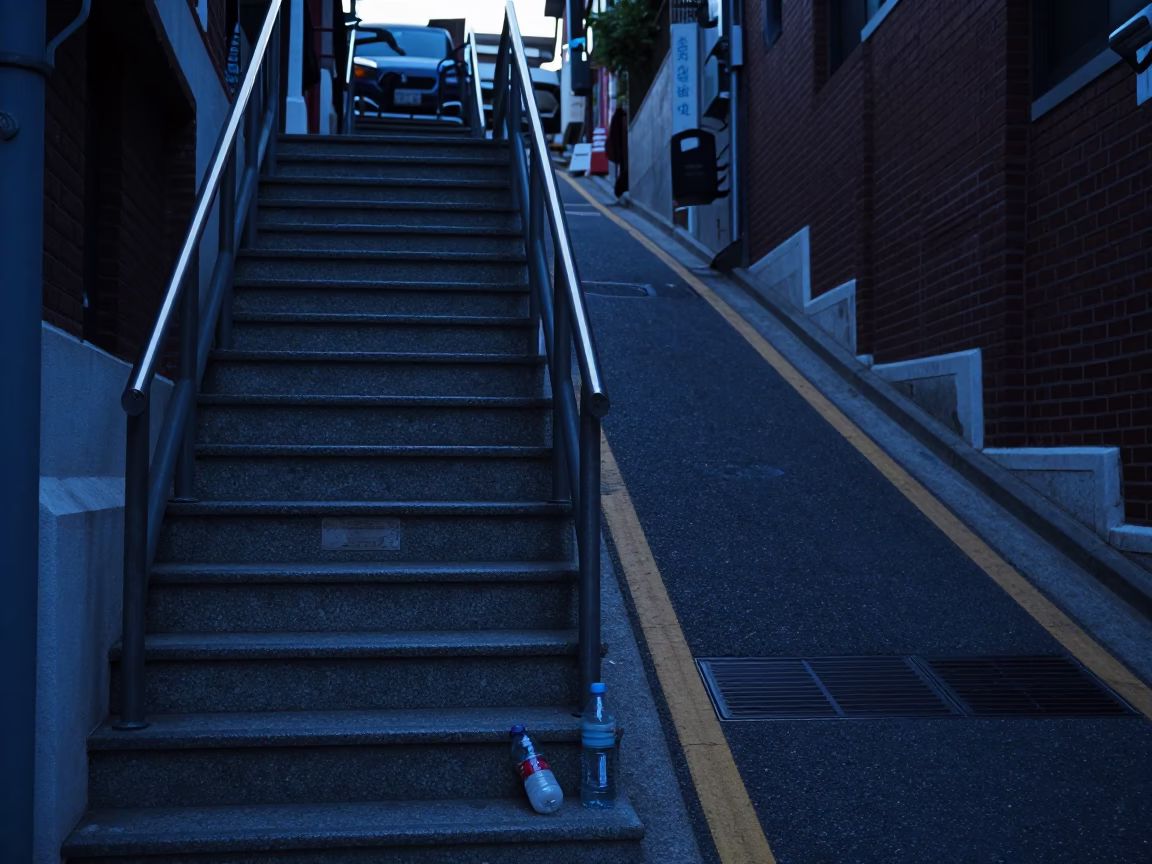 Early Morning Seoul Street Scene with Stair Rail and Bottle Near Convenience Store in in Seoul, South Korea