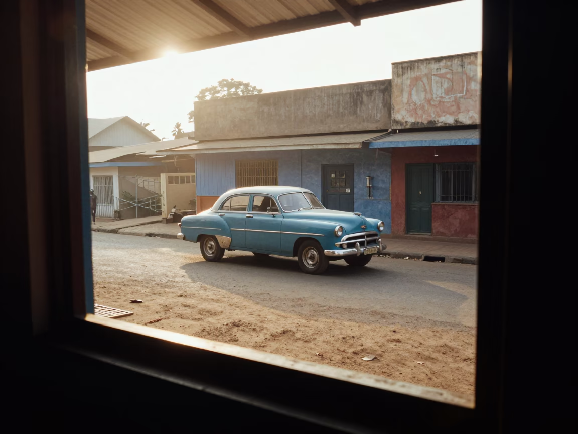 Early Morning Street Scene in Accra Ghana with Vintage Car and Local Market Activity in in Accra, Ghana