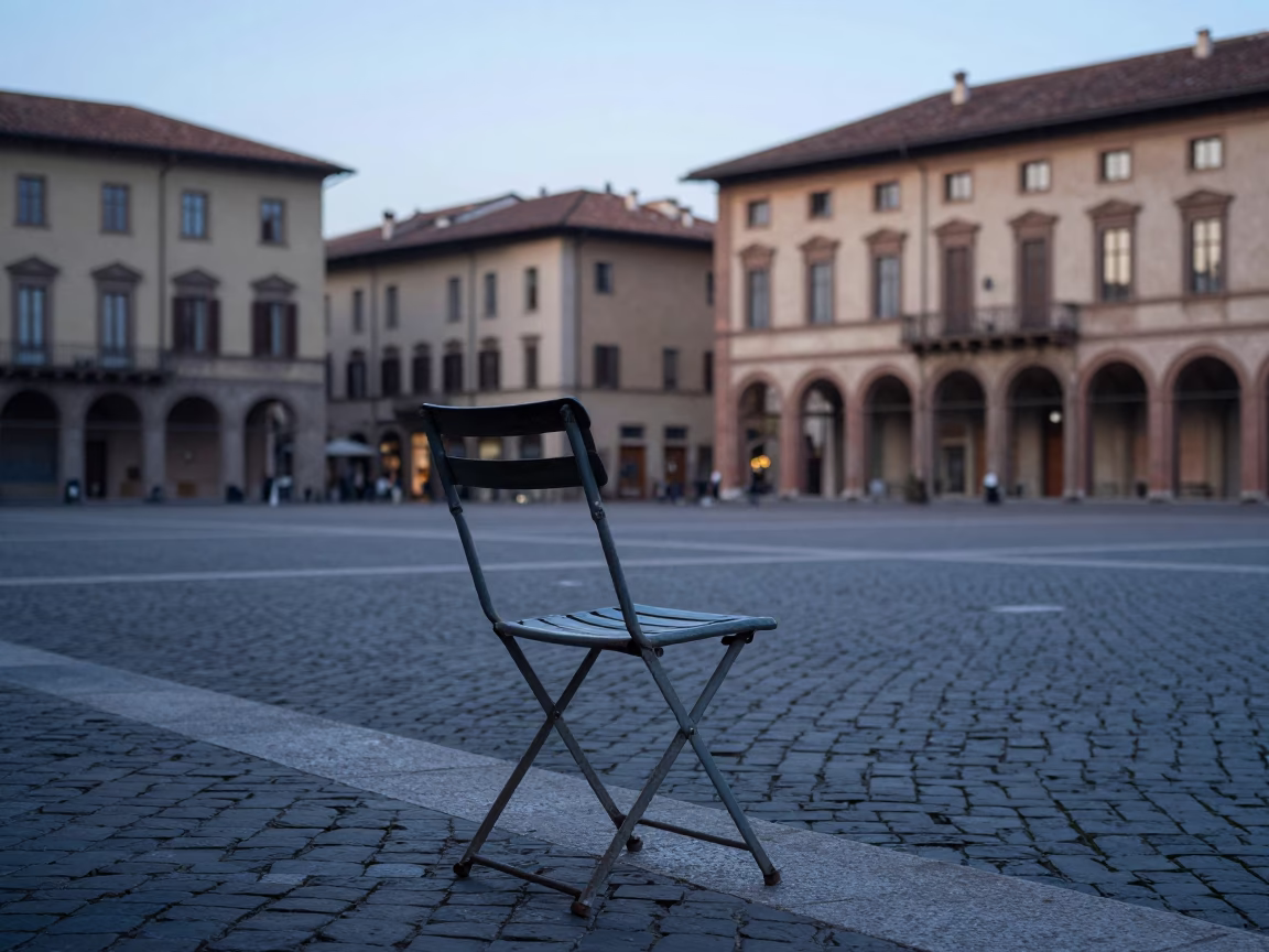 Early Morning Street Scene in Bologna Italy with Vintage Folding Chair and Dawn Light in in Bologna, Italy