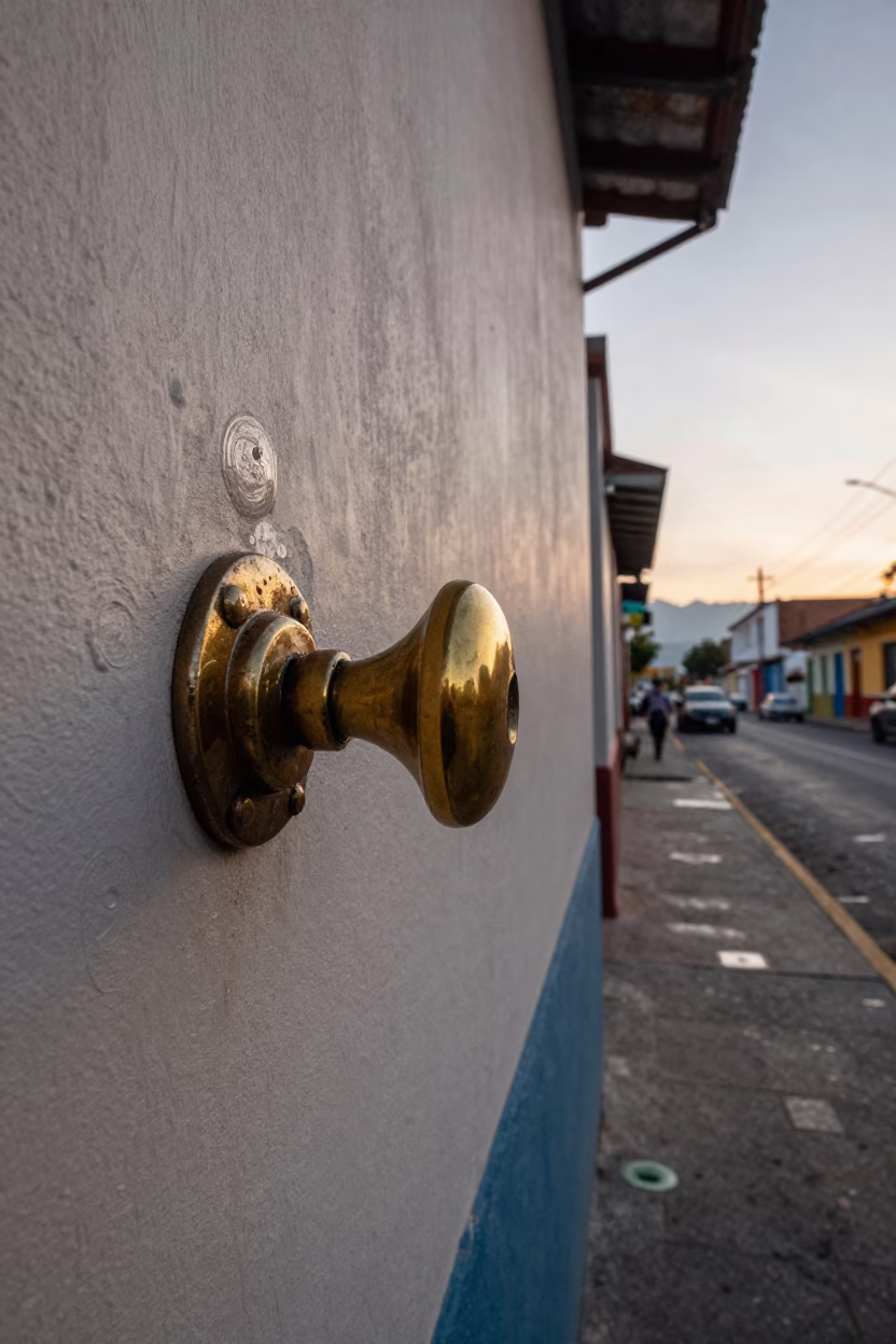 Early Morning Street Scene in Medellin Colombia with Latch and Doorknob Details in in Medellin, Colombia