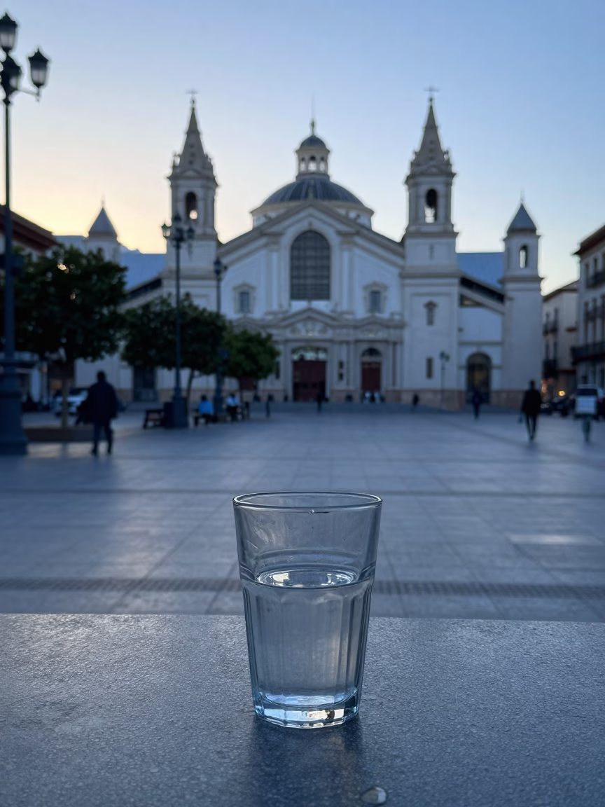Early Morning Street Scene in Valencia Spain with Glass Tumbler on Table in in Valencia, Spain