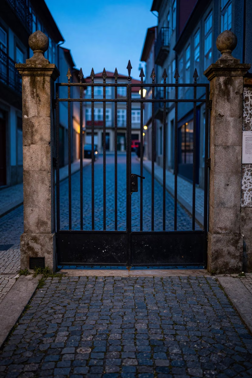 Early Morning Street View of Porto Portugal Cobblestones and Iron Gates in in Porto, Portugal