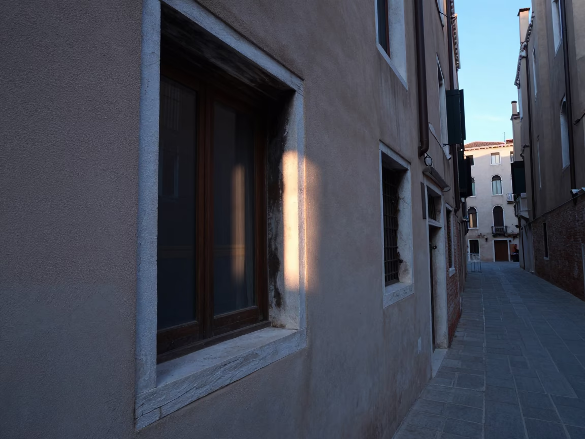 Early Morning Venetian Street Scene with Window Light on Doorframe and Local Life in in Venice, Italy