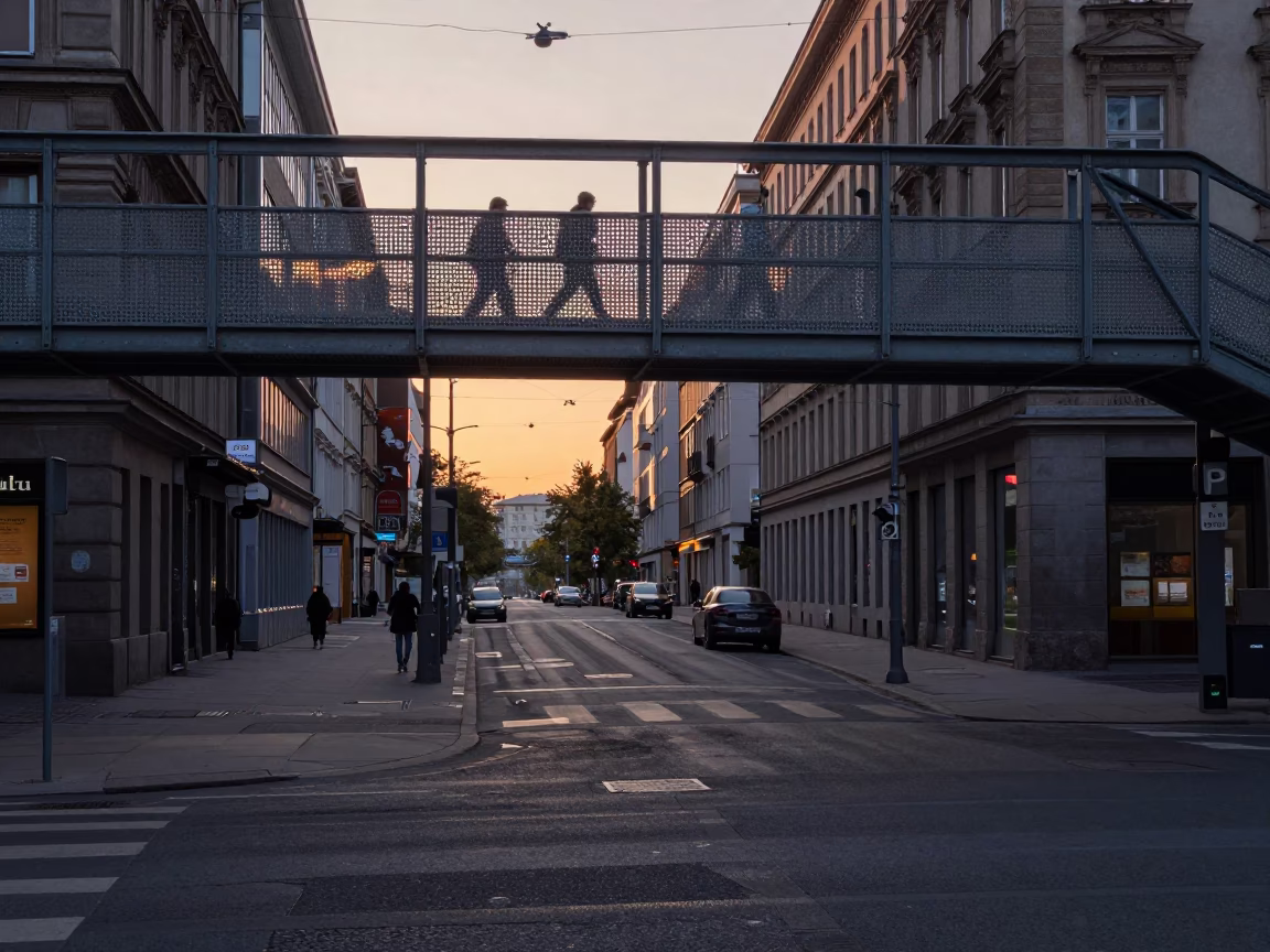 Early Morning Vienna Street Scene with Perforated Metal Pedestrian Overpass and Wet Footprints in in Vienna, Austria