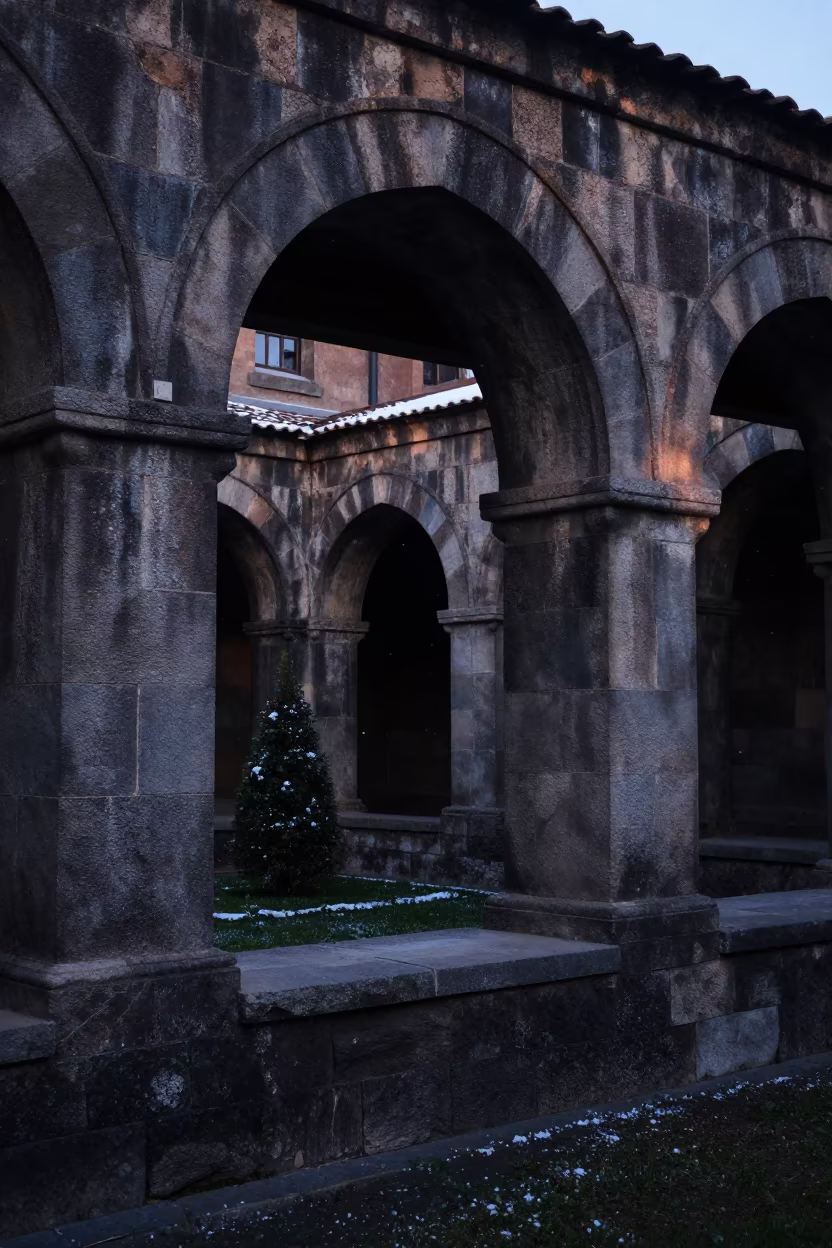 Early Spring Snow in Armenian Stone Cloister in in a cloister garden in Armenia