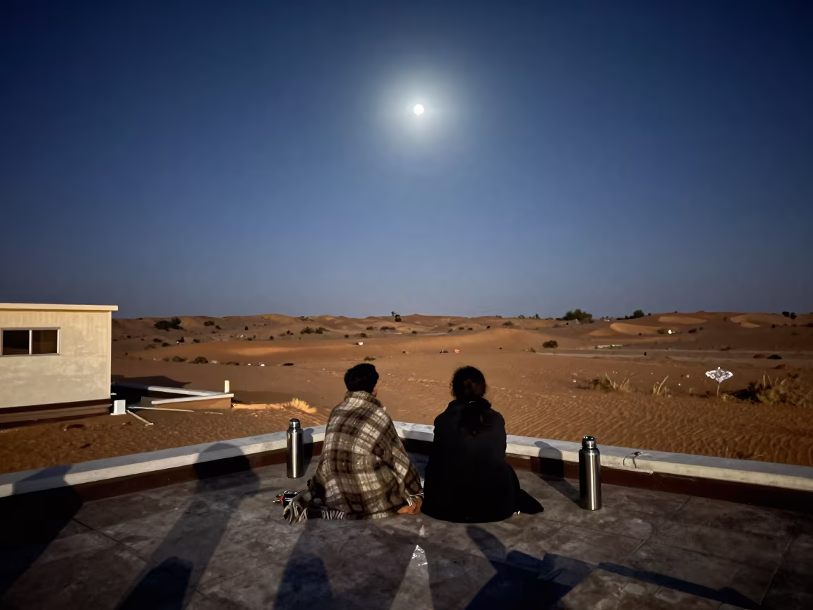 Eclipse View From Rooftop With Blankets Near Phnom Penh in from a dune-backed overlook in clear desert air near Phnom Penh