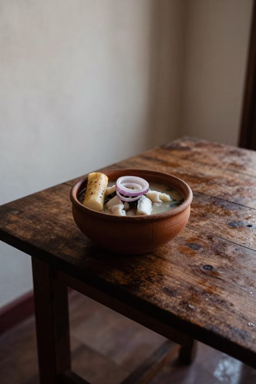 Ecuadorian Encebollado Soup on Restaurant Table in on a restaurant table in Duékoué