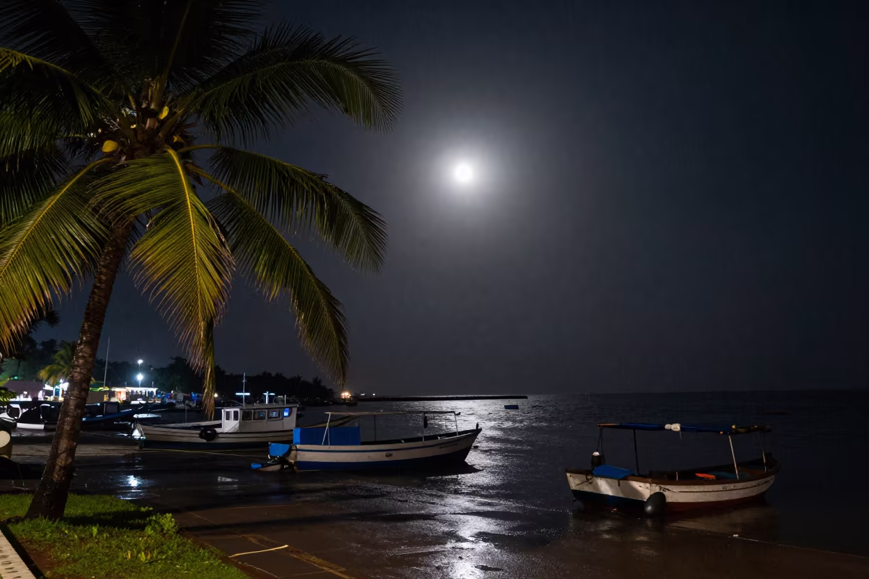 Enormous Super Moon Rising Over Goa Harbor in beneath a moon-washed horizon in Goa