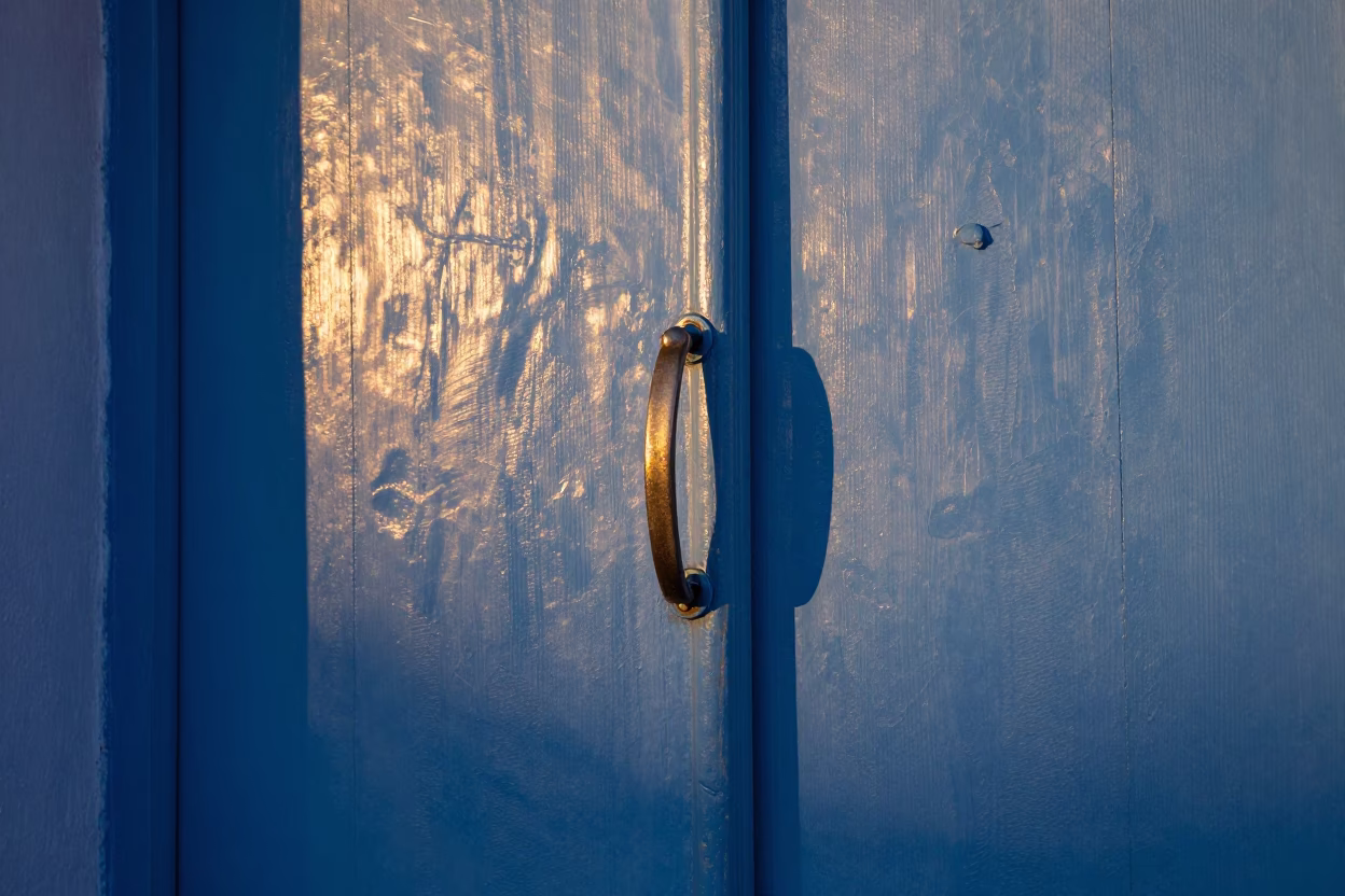 Essaouira Morocco Dawn Light on Weathered Blue Door Handle and Condensation in in Essaouira, Morocco