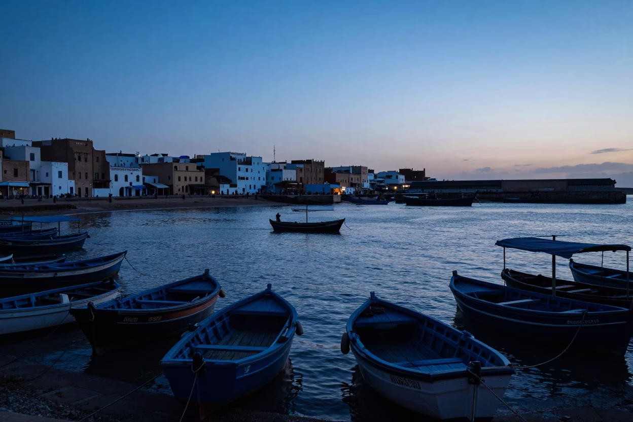 Essaouira Morocco Evening Harbor View with Traditional Fishing Boats and Coastal Architecture in in Essaouira, Morocco