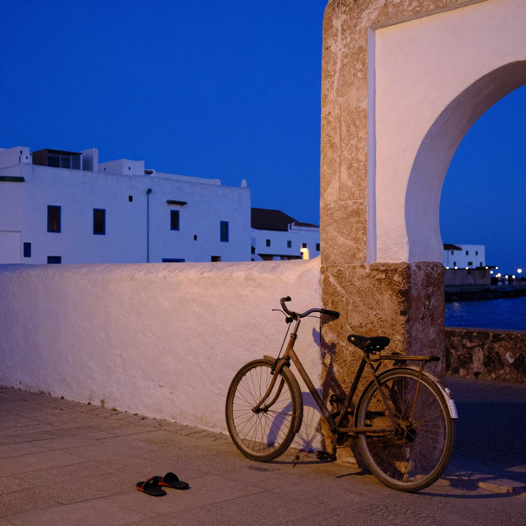 Essaouira Morocco indigo twilight street scene with bicycle and slippers in in Essaouira, Morocco