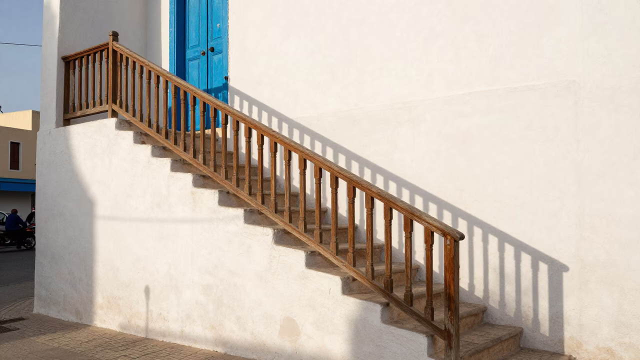 Essaouira Morocco Late Afternoon Street Scene with Stair Rail and Coastal Architecture in in Essaouira, Morocco