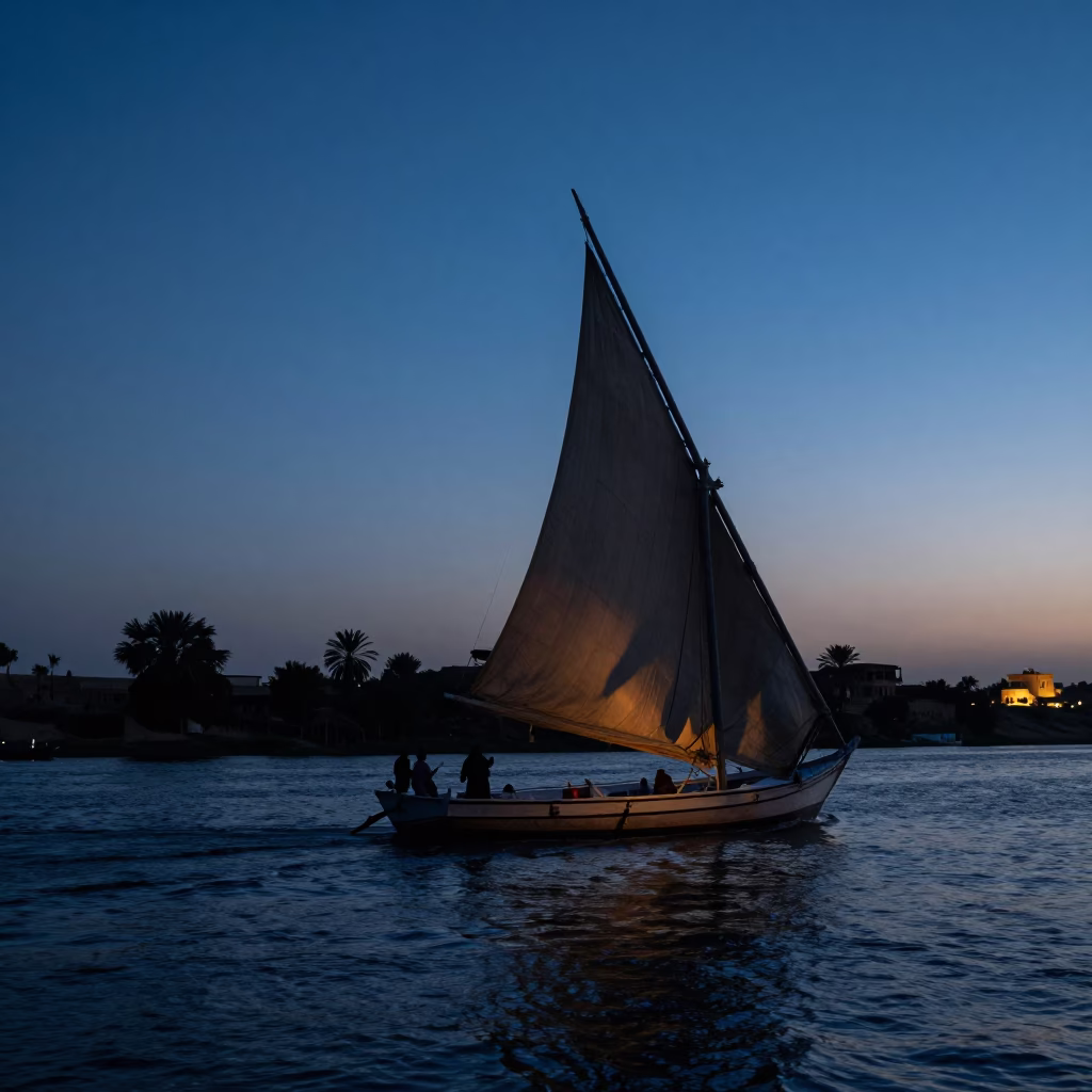 Evening Dhow Sailing on the Nile River in Cairo Egypt Under Blue Light in in Cairo, Egypt