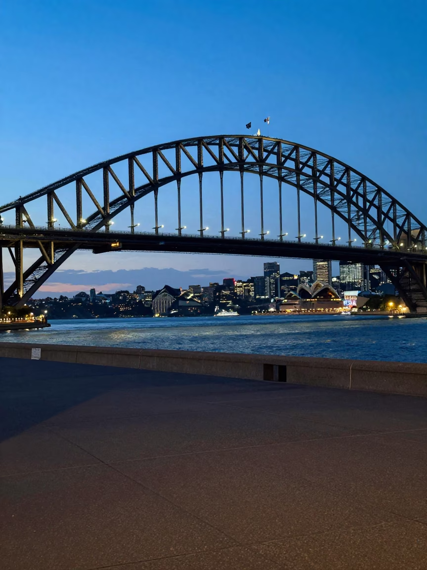 Evening Light on Sydney Harbour Bridge and Circular Quay Wharf in in Sydney, New South Wales, Australia