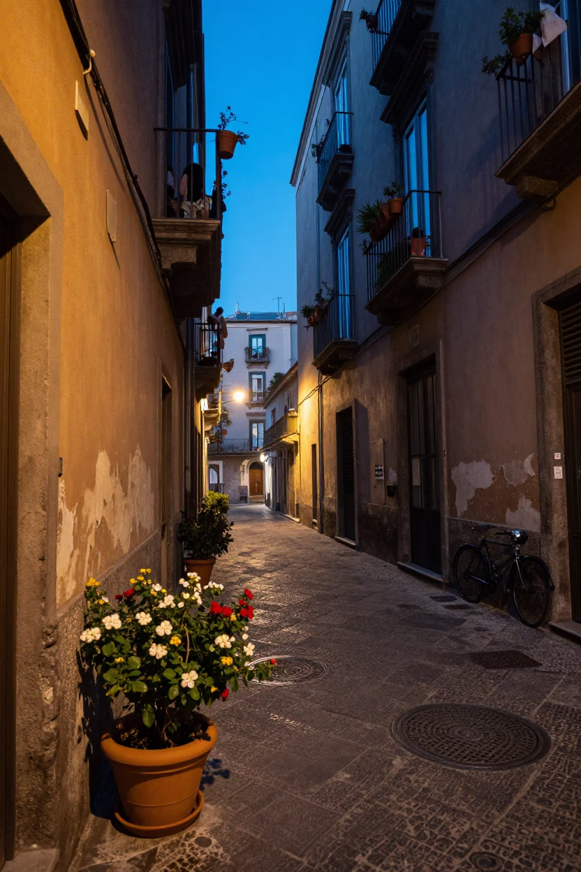 Evening Naples Street Scene with Flowerpot and Cup on Balcony Railing in in Naples, Italy