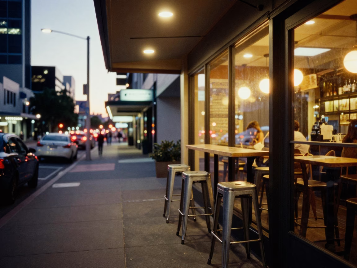 Evening Street Scene in Adelaide South Australia with Bar Stools and City Lights in in Adelaide, South Australia, Australia