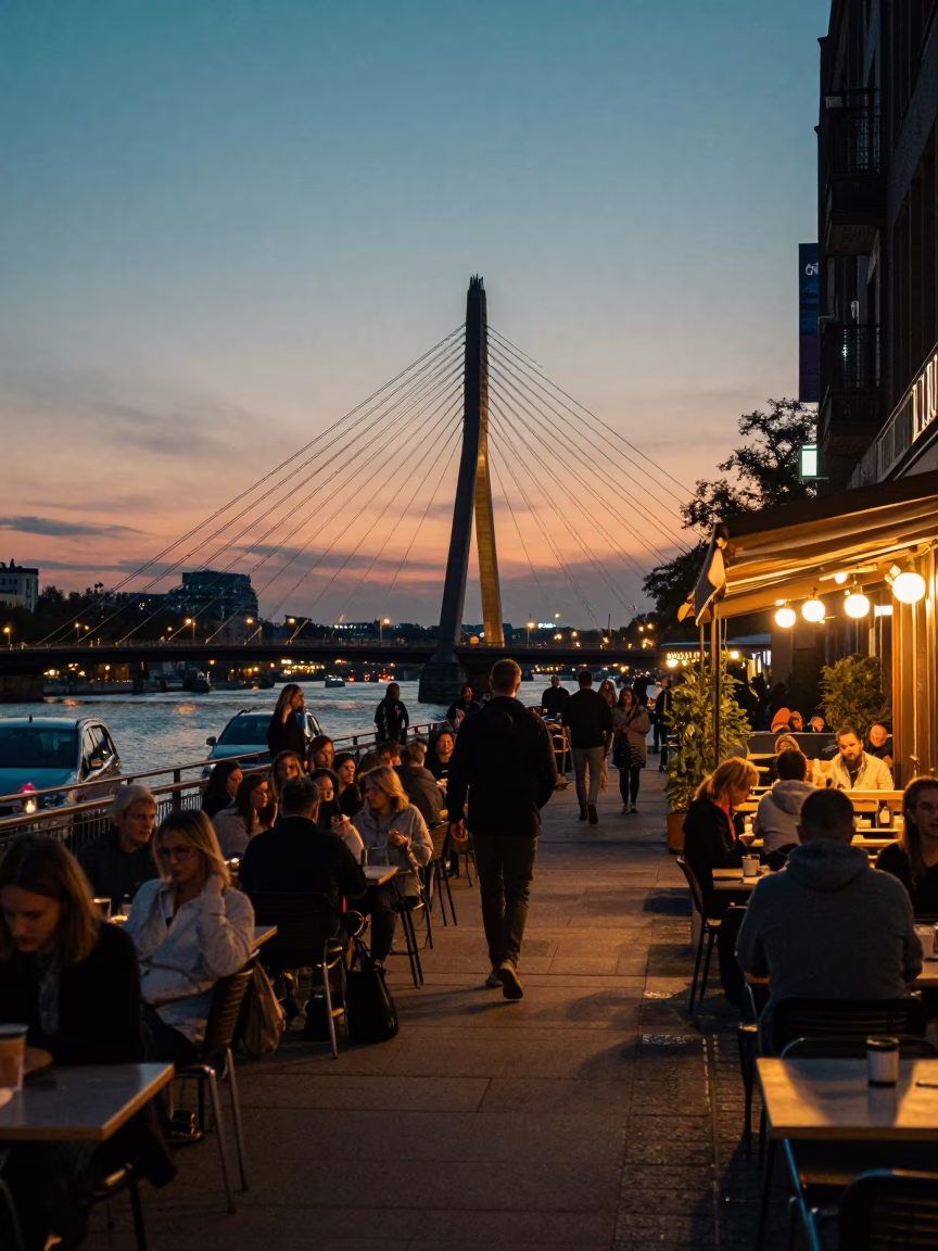 Evening Street Scene in Berlin Germany with Cable-Stayed Bridge and Local Dining in in Berlin, Germany