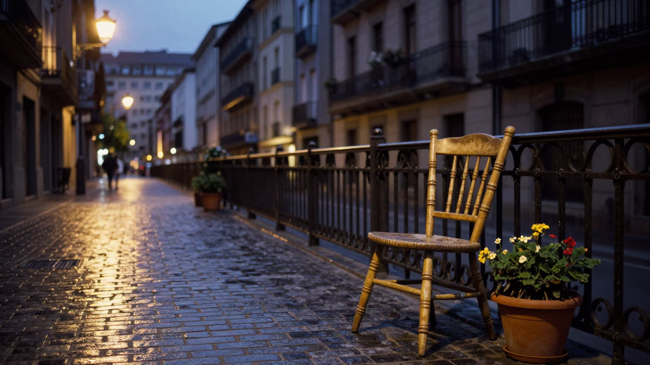 Evening Street Scene in Bilbao Spain with Spindle Chair and Flowerpot in in Bilbao, Spain