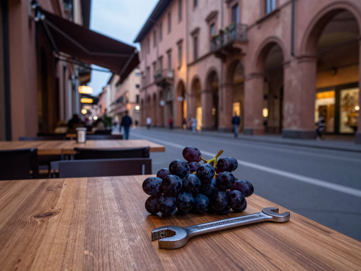Evening Street Scene in Bologna Italy with Grapes and Wrench on Table in in Bologna, Italy