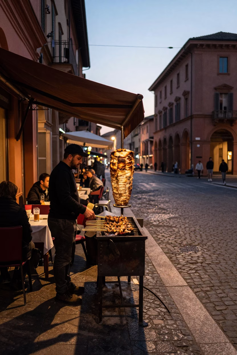 Evening Street Scene in Bologna Italy with Outdoor Dining and Kebab Grill in in Bologna, Italy
