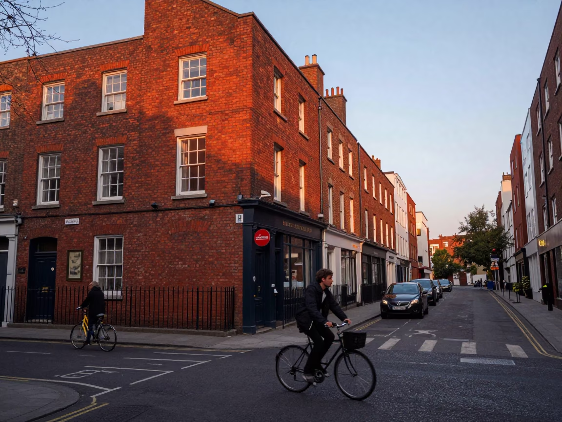 Evening Street Scene in Dublin Ireland With Cyclist and Red Brick Architecture in in Dublin, Ireland