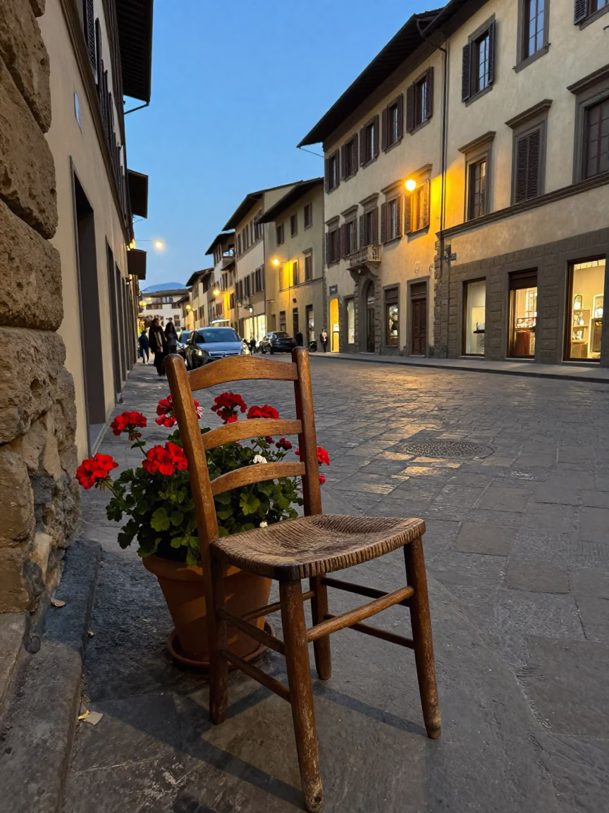 Evening Street Scene in Florence Italy with Geraniums and Ladder Back Chair in in Florence, Italy