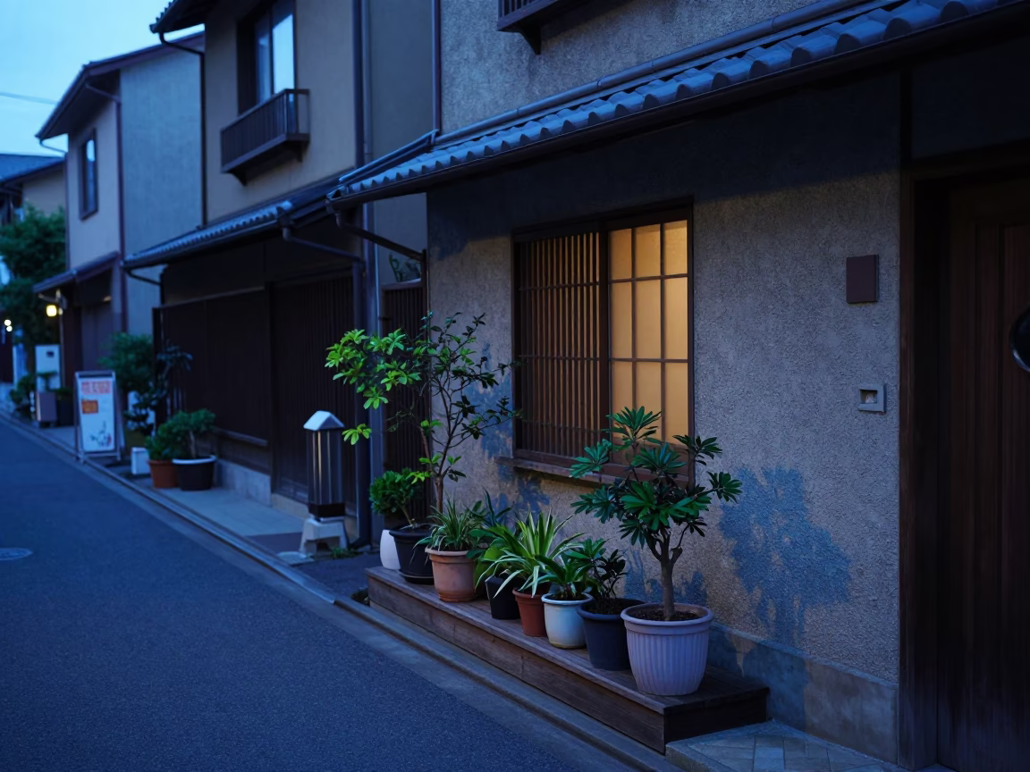 Evening street scene in Fukuoka Japan with houseplants and local architecture in in Fukuoka, Japan